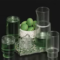 Transparent Glass Tableware Set With Green Macarons Ice Cubes And Glittery Tray