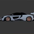 Silver Sleek Supercar With Black Roof Rear Spoiler And Red Alloy Wheels