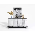 Elegant Black And White Sideboard Featuring Pampas Grass Blue Vase Sculpture And Classical Portrait