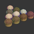 Delicious Assorted Mini Cupcakes With White Cream And Chocolate Crumble Toppings