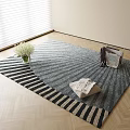 Square Blue Gray Striped Rug on Wooden Floor with White Bouquet Vase and Folded Newspaper