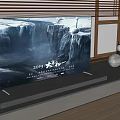 Modern Flat Screen Television On Stand With Waterfall Display And Decorative Items