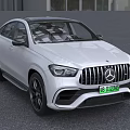 White Mercedes Coupe SUV With Sporty Front Grille And Stylish Exterior Design
