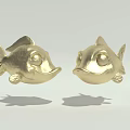 Two Shiny Golden Fish Decorative Figurines with Smooth Surface on White Background