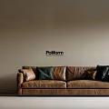 Pollform Brown Leather Three Seater Sofa With Green And Black Cushions On Neutral Wall