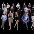 Diverse Team of Business Professionals in Formal Attire Posing Together