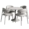 Modern Round Dining Table Set With Gray Fabric Chairs And Black Metal Legs
