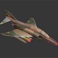 F 4 Fighter Jet Model With Camouflage Paint Missiles Under Wings On Black Background
