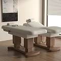 Two White Massage Chairs With Wooden Base In Room With Wooden Floor And Window Blinds