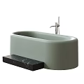 Modern Beige Bathtub Design With Black Marble Countertop And Faucet