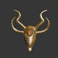 Golden Decorative Animal Skull with Curved Horns and Red Gemstone on Forehead