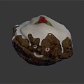 Festive Christmas Pudding With Smiling Face White Icing And Red Berries