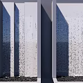 Modern Water Feature Wall With Flowing Water And Pebble Base Shadow Effects