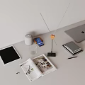 Modern Home Office Desk Setup With Tablet Laptop Smart Speaker Magazine Books Pen Glass