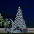 Giant Colorful Light Up Tree Decoration With Archway And Night Sky Background