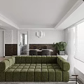 Bright Modern Open Plan Living And Dining Room With Cozy Green Sofa And Large Windows