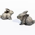 Two Gray Sitting Rabbit Dolls As Decorative Figurines On White Background