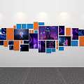 Modern Photo Wall With Blue And Orange Frames Featuring Tech Themed Images On White Wall