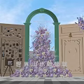 Instagrammable Photo Check in Spot With Green Archway Flower Tree And Purple Flowers