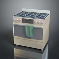 Beige Gas Range Oven With Multiple Burners Control Knobs And Green Towel