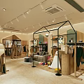 Bright Modern Clothing Store Interior With Display Racks Dresses Sofa And Cozy Rug