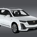 White Cadillac SUV Modern Exterior Design With Sleek Grille And Alloy Wheels