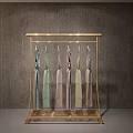 Gold Modern Clothes Rack With Hanging Dresses On Gray Textured Wall Background