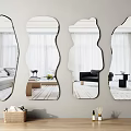 Irregular Shaped Wall Mounted Mirrors Reflecting Living Room Interior With Decor Items