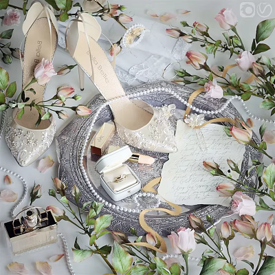 Elegant Wedding Shoes Adorned With Lace And Pearls Surrounded By Pink Flowers 3d model