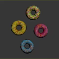 Vibrant Colorful Donuts With Dripping Frosting And Sprinkles On Black Surface