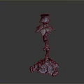 Blue Metal Candlestick With Intricate Floral Design And Decorative Base