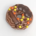 Assorted Donuts Decorated With Chocolate Fruits And Cookies In A Box