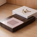 Modern Coffee Table With Two Toned Layers White Top Dark Base And Decorative Figurine 3d model