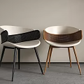 Modern White Dining Chairs With Black And Brown Woven Armrests And Black Wooden Legs