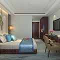 Elegant Hotel Guest Room With Blue Bed Runner Wall Art Table Lamps And Writing Desk