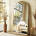 Cozy Living Room Interior With Arch Mirror Beige Sofa Throw Blanket And Dried Flowers