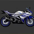 Sporty White And Blue Motorcycle With Blue Alloy Wheels And Sleek Design