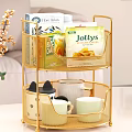 Cozy Living Room With Golden Two Tier Metal Rack Holding Snacks And Mugs