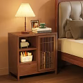 Wooden Bedside Table Featuring Lamp Photo Frame Cup Books beside Bed with Upholstered Headboard