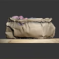 Fresh Purple And Blue Fruits in Paper Bag on Round Wooden Tray Against Dark Background