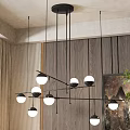 Modern Black Metal Chandelier With Multiple Spherical Bulbs In Wooden Wall Interior