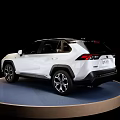 White Toyota SUV Showcased On Blue Circular Display Platform With Black Background