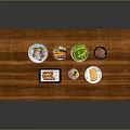 Assorted Fresh Food Dishes Arranged On Wooden Table With Vegetables Meat And Sides