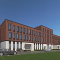 Red Brick Industrial Factory Building Featuring White Base Many Windows Green Lawn And Parking Lot
