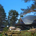 Unique Forest Guesthouse With Wavy Roof Design On Elevated Platform And Pine Tree Surroundings