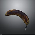 Close Up Image Of Overripe Banana With Brown Spots On Gray Background