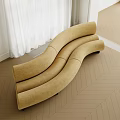 Modern Beige Curved Sectional Sofa In Living Space With Herringbone Flooring And White Curtains