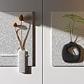 Wall Decor with Brown Dried Flowers and Green Plants on White Textured Background
