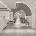 Modern White Wedding Dress Shop Interior With Arched Design And Gowns