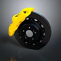 High Performance Car Tire With Black Brake Disc And Yellow Caliper Design